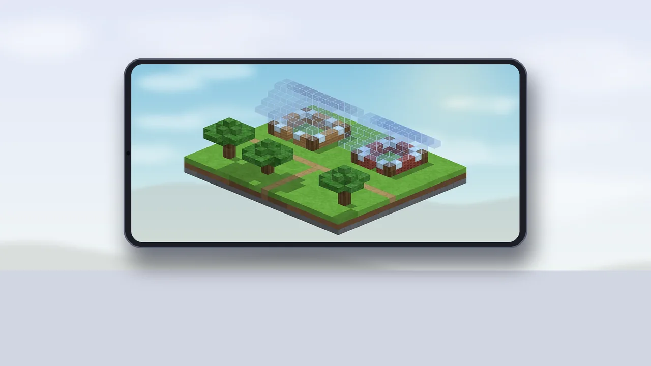 Landscape phone on a desk showing a voxel village with blue ghost schematic blocks